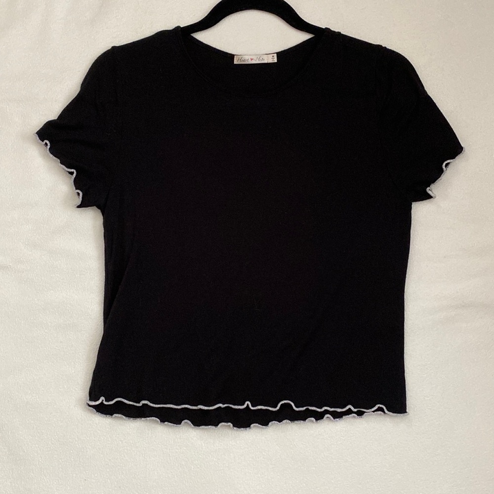 Black crop top with white ruffles